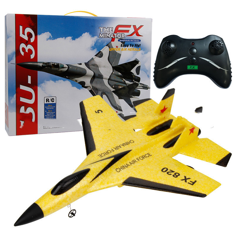 Yellow Version of The RC Plane  with remote control and the box it comes with when purchased